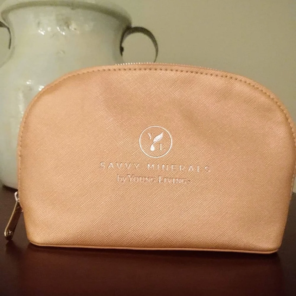 Young Living pink zipper